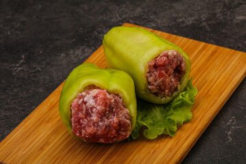 Raw stuffed bell pepper with meat