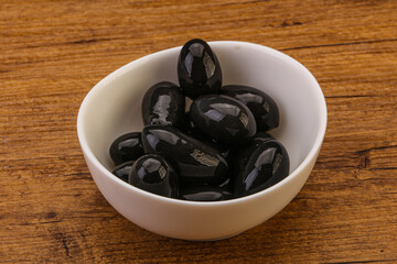 Pickled black olives in the bowl