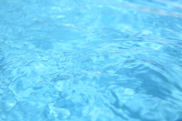 Swimming pool with clear water as background, closeup