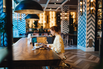Caucasian copywriter creating social web article for sharing to public website using 4g wireless...
