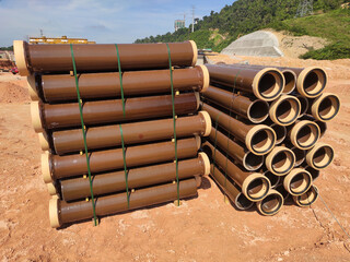 SEREMBAN, MALAYSIA -MARCH 2, 2020: Vitrified clay pipe stacked at the construction site. Commonly...
