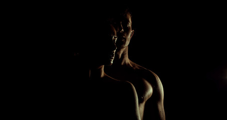 Couple on a dark background. Sensual. Couple love. Shadow. 