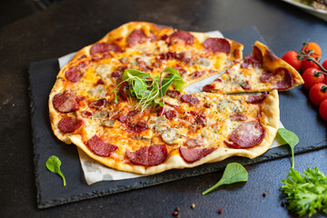 pizza meat salami sausage cheese serving size fast food top view place copy space for text food background rustic