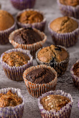 Sweet cakes or cupcakes on light marble background. Holiday cake celebration, delicious dessert, close up