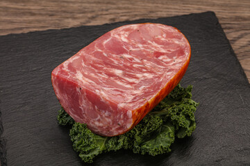 Beef ham piece over board