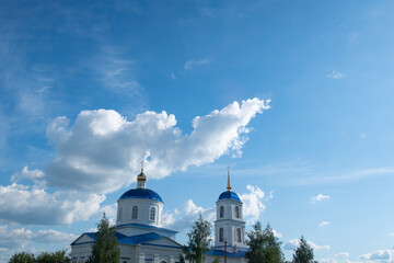 Beautiful storm clouds over a green field.