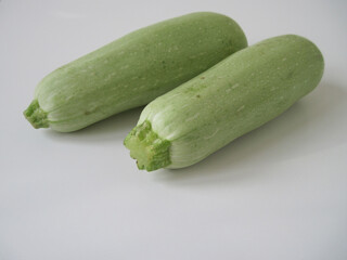 fresh zucchini on white background