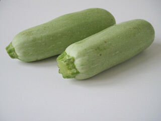 fresh zucchini on white background