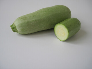 fresh zucchini on white background