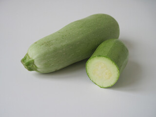 fresh zucchini on white background
