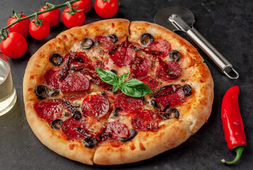 pizza pepperoni with salami sausages, mozzarella, olives, Provencal herbs, signature tomato sauce...
