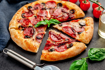 pizza pepperoni with salami sausages, mozzarella, olives, Provencal herbs, signature tomato sauce...