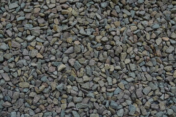 Stone wall, large gray stones, civil and industrial construction.