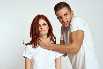Portrait of man and woman family love emotions light background close-up cropped view