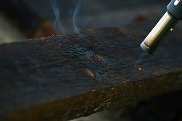 Burning the Board with a gas burner