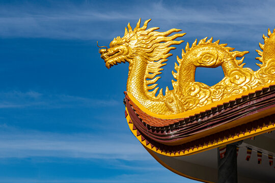 Vietnam, Phu Quoc island, Ho Quoc Pagoda, Detail ofÔøΩgolden dragon on pagoda roof