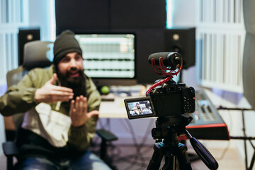 Dj making a video tutorial in his studio