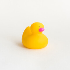 Toy yellow rubber duck isolated on white background. Opposition symbol and political struggle