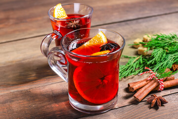 mulled drink red wine fruit tea hot grog glass winter serving size spices beverage New Year and...