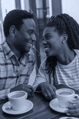 Young boyfriends look and talk at the coffe bakery shop