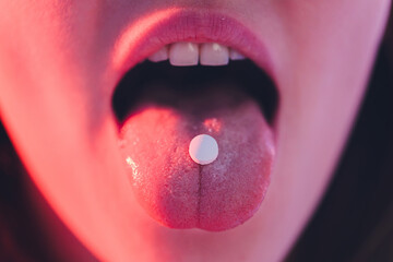 beautiful girl with lsd on tongue in nightclub with pink smoke. - obrazy, fototapety, plakaty