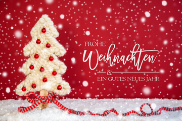 German Calligraphy Frohe Weihnachten Und Ein Gutes Neues Jahr Means Merry Christmas And A Happy New Year. White Fabric Tree With Snow And Red Background. Decoration Like Red Ribbon And Snowflakes
