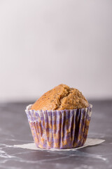 Sweet cakes or cupcakes on light marble background. Holiday cake celebration, delicious dessert, close up