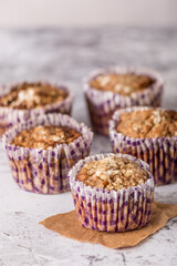 Sweet cakes or cupcakes on light marble background. Holiday cake celebration, delicious dessert, close up