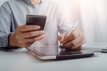 Searching Browsing Internet Data Information with blank search bar.businessman working with smart phone, tablet and laptop computer on desk in office. Networking Concept