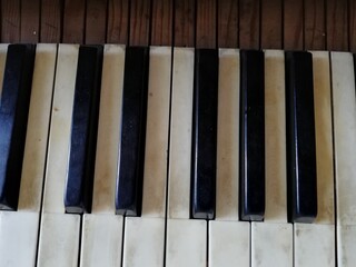 Closeup of antique and ruined piano keys
