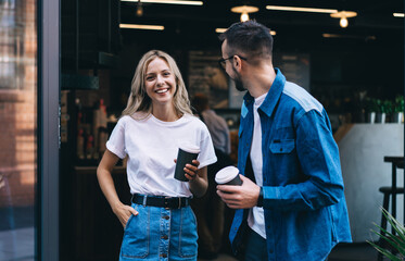 Cheerful woman and man laughing together