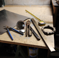 Tools of the tinsmith working in his workshop - obrazy, fototapety, plakaty