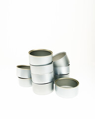 Empty food cans for recycling over white background
