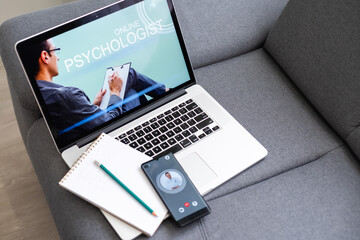 videoconferencing with psychologist doctor on laptop