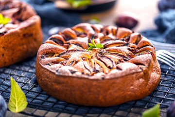 close-up view of delicious sweet fruit pies with organic plums © karepa