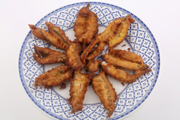 anchovies fried with egg and flour