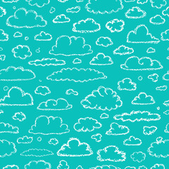 Clouds pattern. Children drawling style cloud print. Hand drawn wax crayons art on blue backdrop. Chalk style isolated clouds background. White pastel crayons drawn clouds texture.

