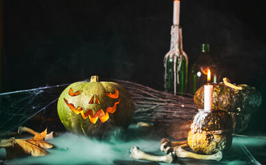 Halloween background. Spooky pumpkin in the dark