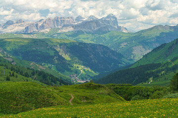 Naklejka na ściany i meble Mountain landscape along the road to Pordoi pass, Dolomites