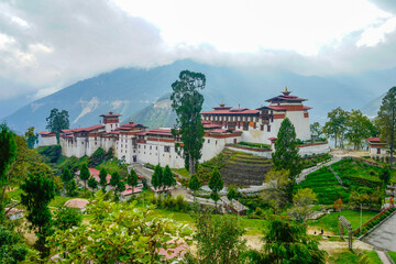 Fototapeta na wymiar Central Bhutan, the Trongsa Dzong, the biggest forteress in Bhutan. Situated on hill and overlooking green the valley. 