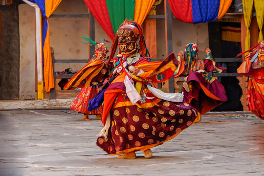 Bumthang in Bhutan at the yearly  festival in the monastery of Jakar. A monk is wearing  a colourful traditional mask.