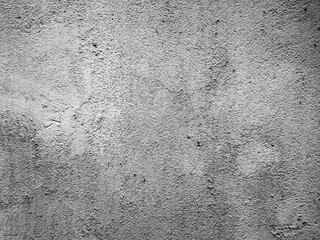 black and white rough cement wall texture with cracks, a background pattern