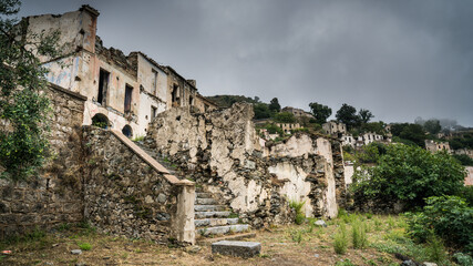 Ruins of the abandoned ghost town Gairo Vecchio, Sardinia, Italy