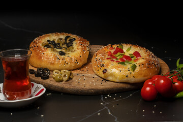 Traditional Turkish acma bread buns with olive oil and olives Homemade pastry