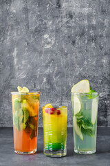 Three glasses with fruit refreshing drink
