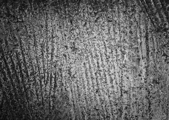 black and white rough cement wall texture with cracks, a background pattern