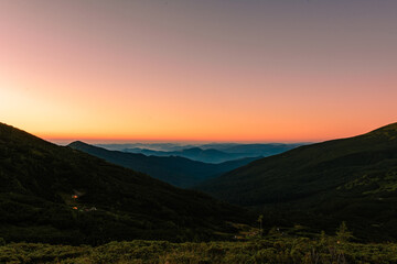 Picturesque landscapes of the Carpathians, before sunrise there is a light fog, sunrise in Montenegro.
