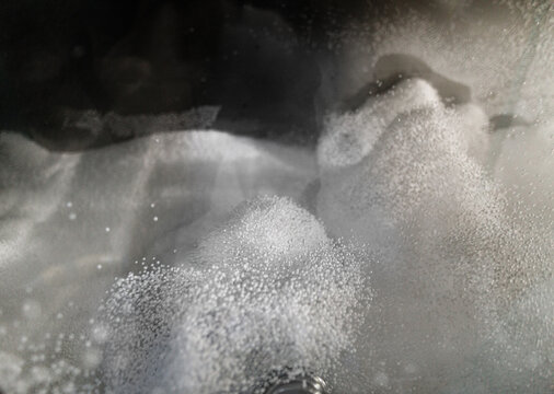 Industrial production of polystyrene foam insulation panels or plates. The process of conversion of pre-expanded polystyrene beads under the action of temperature 120 or 160°C in the heating chamber.