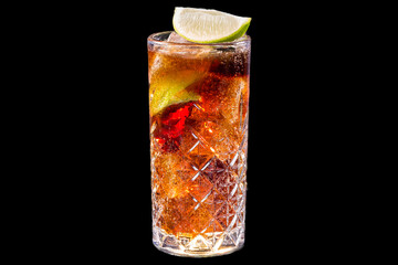Cuba libre cocktail in a glass with ice cubes, art view