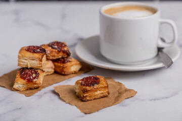 quince cookies on marble board with coffee